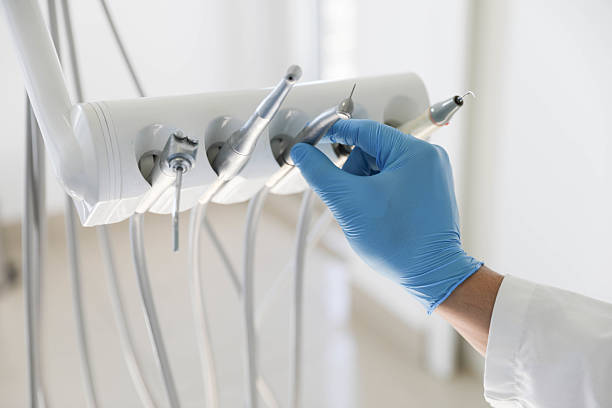 Professional Invisalign Clear Aligners technician working in Prudenville, MI